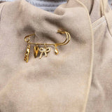 Charm Brooch