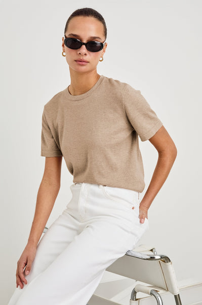 Cotton Cashmere Short Sleeve Tee in heather oat, styled seated