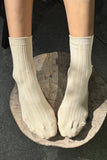 Her Socks - Porcelain