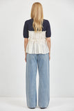 Liora Top in Navy, back view with ruffle detail