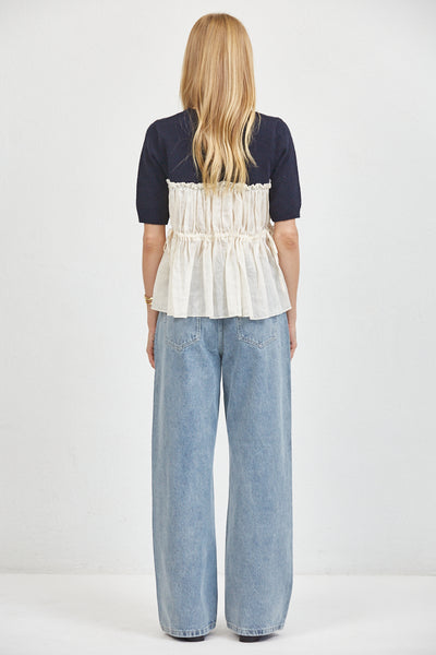 Liora Top in Navy, back view with ruffle detail