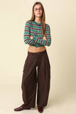 Ella Cardigan in Dark Green, full length styled with trousers