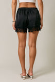 LE LIS Satin Lace Stretch Shorts in Black