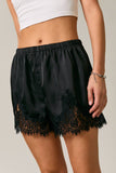 LE LIS Satin Lace Stretch Shorts in Black