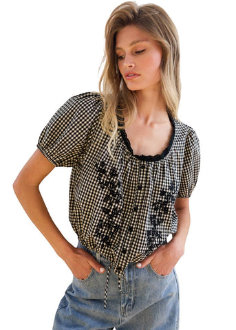 VIDA MOULIN black and white gingham blouse with floral embroidery, puff sleeves, and scoop neckline.