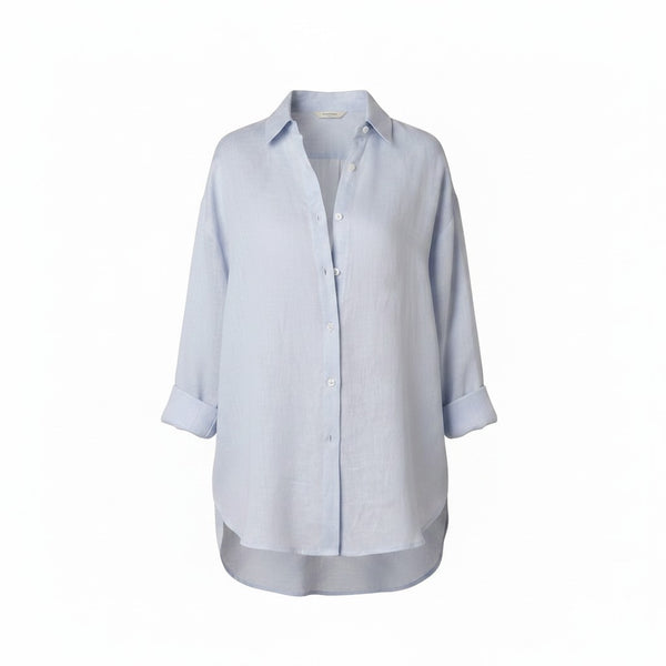 VIDA MOULIN Jada light blue linen shirt with oversized fit and drop shoulder design.