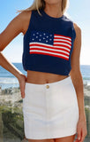 VIDA MOULIN navy blue knit tank top with an embroidered American flag design on the chest. Sleeveless, cropped style.