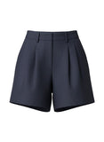 VIDA MOULIN navy linen tailored shorts with high rise, front pleats, buckle closure, and elasticized waistband.
