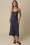 VIDA MOULIN navy blue polka dot midi dress with sweetheart neckline, adjustable straps, and open back. Linen blend.