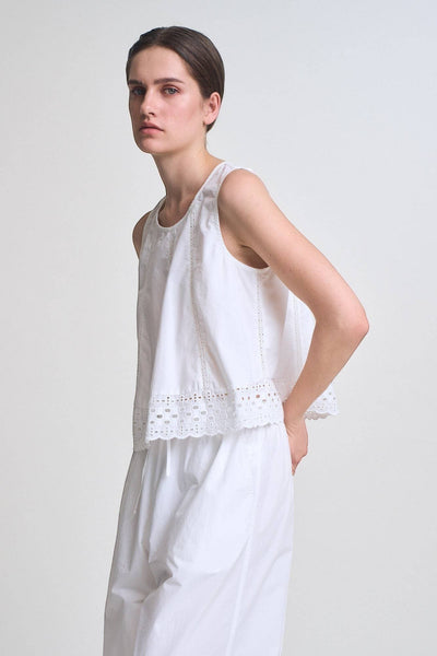 VIDA MOULIN white 100% cotton sleeveless round neck swing top with eyelet lace inset and back self tie.