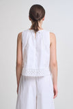 VIDA MOULIN white 100% cotton sleeveless swing top with eyelet lace inset and back self tie detail.